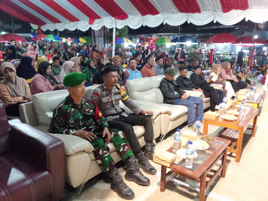 Bhabinkamtibmas Polsek Tenggarong Dampingi Sosialisasi Pilkada 2024 di Maluhu