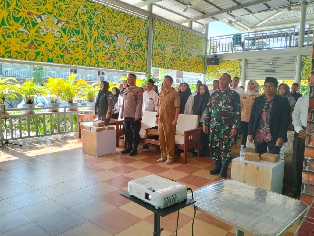 Polsek Sangasanga Dampingi Pelantikan dan Bimbingan Teknis Pengawas TPS Jelang Pilkada 2024