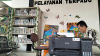 Pojok Literasi dan Pelayanan Terpadu (Doc. Facebook Desa Loa Kulu Kota)